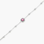 Elegant sterling silver chain bracelet featuring pink moissanite center stone in cushion halo setting with adjustable clasp