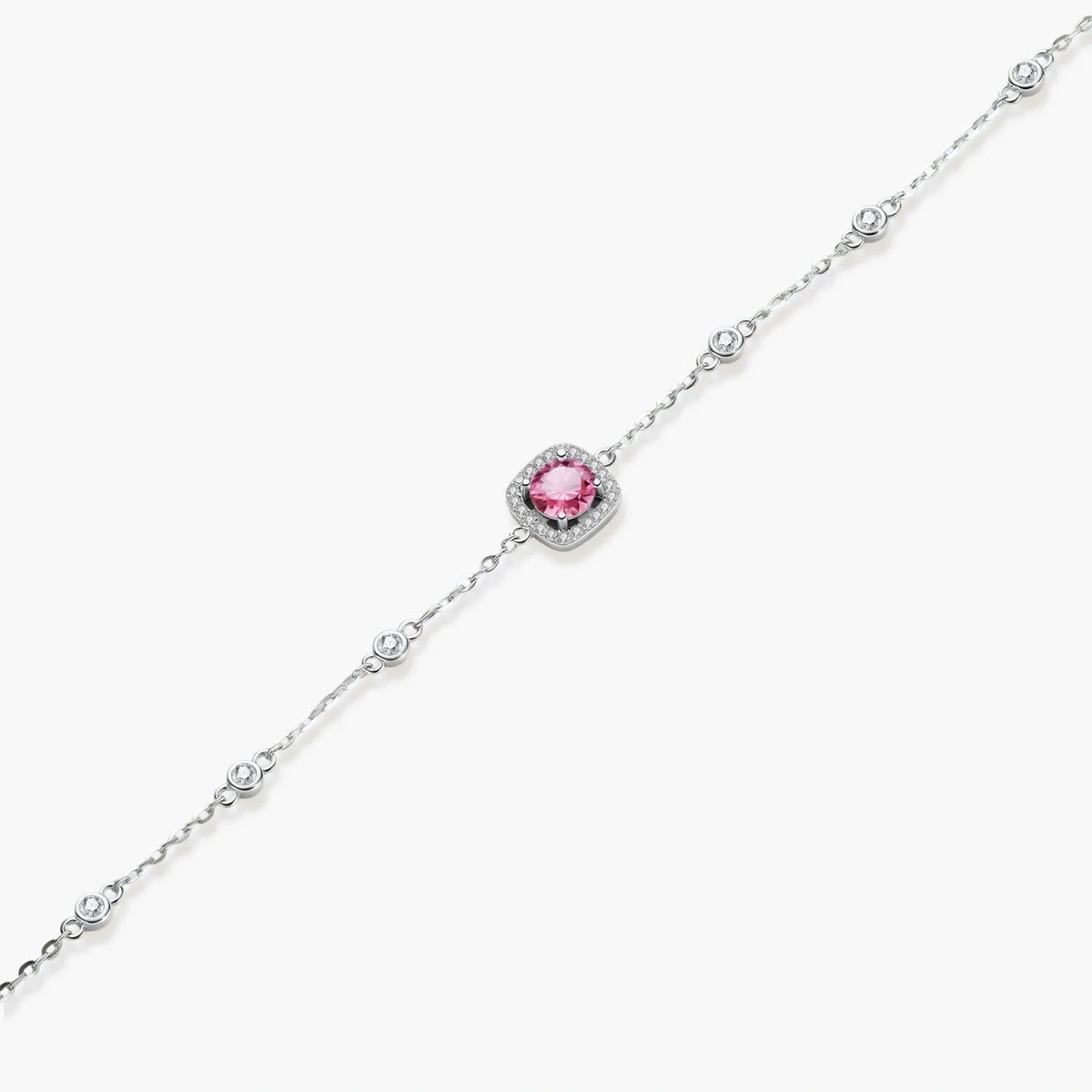 Elegant sterling silver chain bracelet featuring pink moissanite center stone in cushion halo setting with adjustable clasp