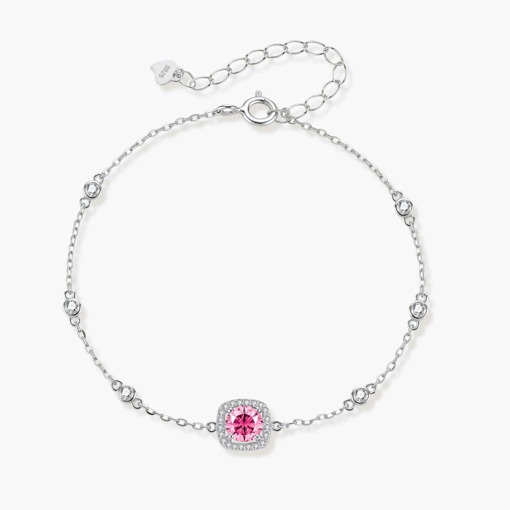 Elegant sterling silver chain bracelet featuring pink moissanite center stone in cushion halo setting with adjustable clasp