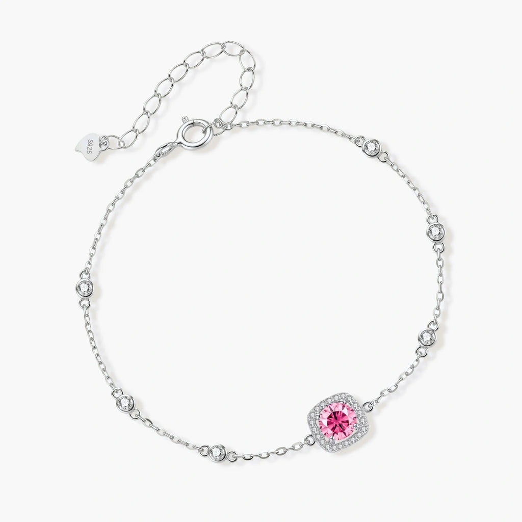 Elegant sterling silver chain bracelet featuring pink moissanite center stone in cushion halo setting with adjustable clasp