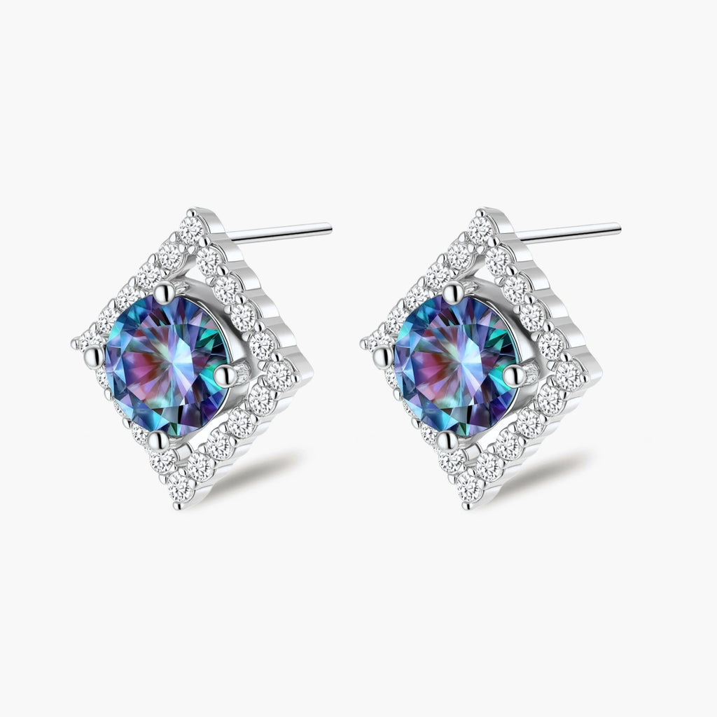 Diamond-shaped sterling silver stud earrings with rainbow moissanite centers surrounded by crystal halos