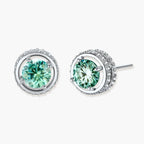 Round green moissanite stud earrings in sterling silver halo settings with brilliant sparkle on white background.