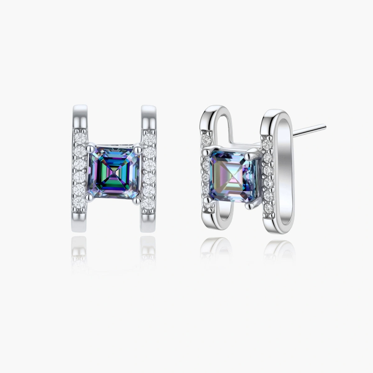 Square moissanite studs in sterling silver geometric setting showing rainbow prismatic fire on white background.