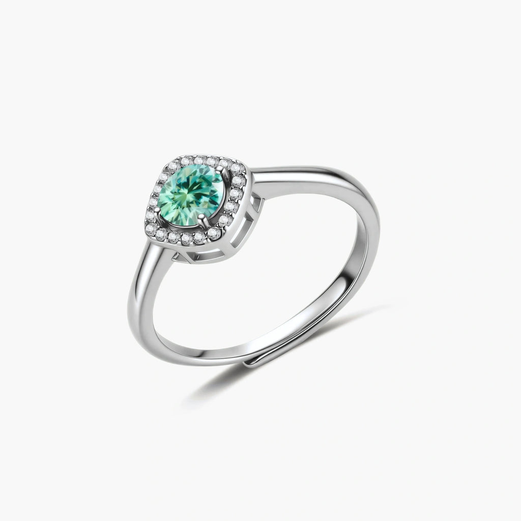Anillo con halo de resplandor esmeralda