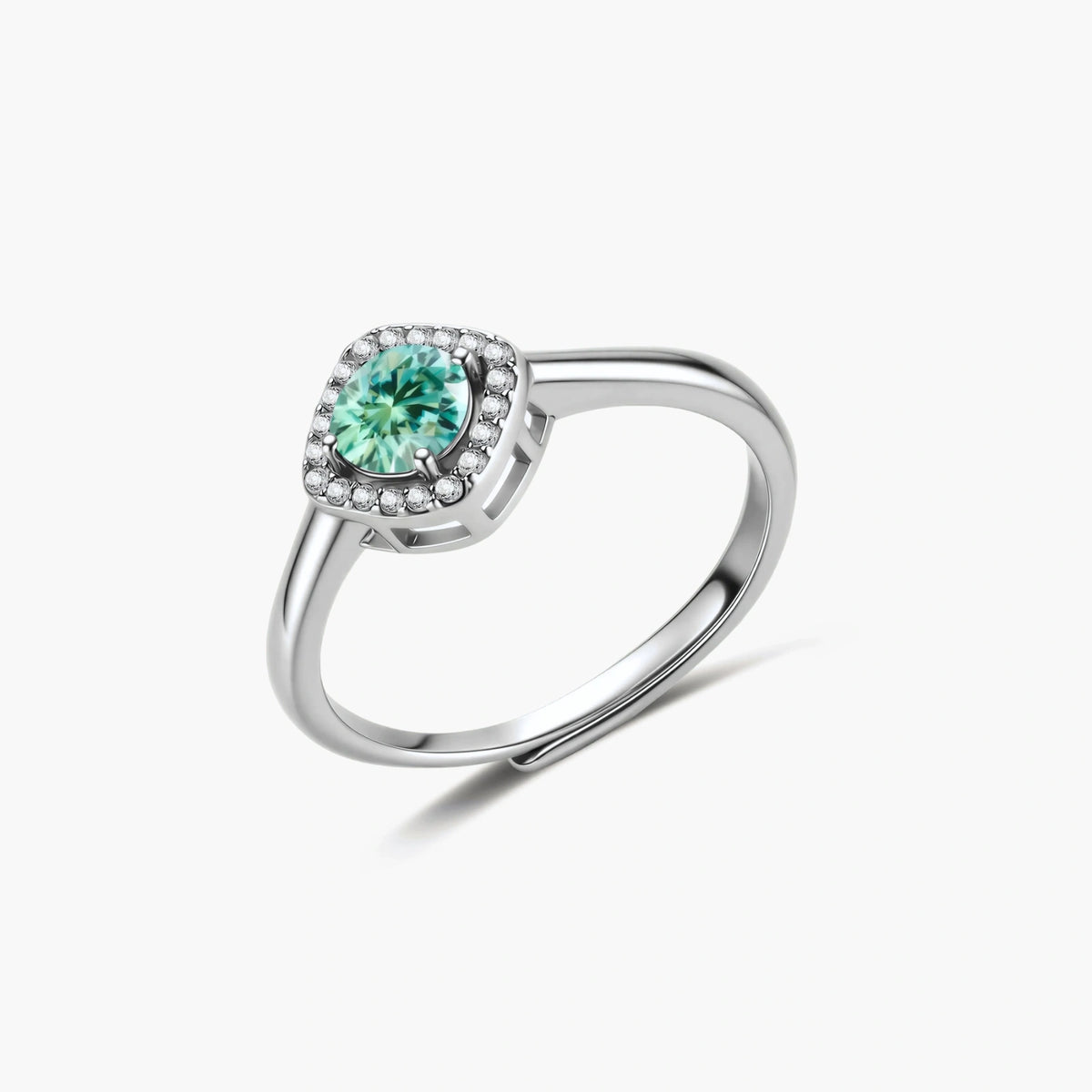 Anillo con halo de resplandor esmeralda