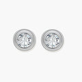 Close-up of sterling silver stud earrings featuring concentric circular frames with brilliant moissanite centers