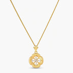 Gold-plated flower pendant necklace with brushed finish, open-work center, marquise CZ stones on wheat chain, S925 stamp.