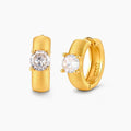18K gold-plated 925 silver huggie hoops with brushed finish and prong-set round CZ solitaire, stamped S925 inside.