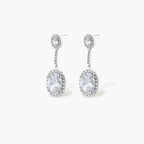 Elegant white gold plated jewelry set with oval cubic zirconia stones in halo settings, featuring Y-necklace and drop earrings.