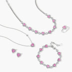 Pink heart-shaped cubic zirconia jewelry set with white gold plating featuring necklace, earrings, bracelet and ring